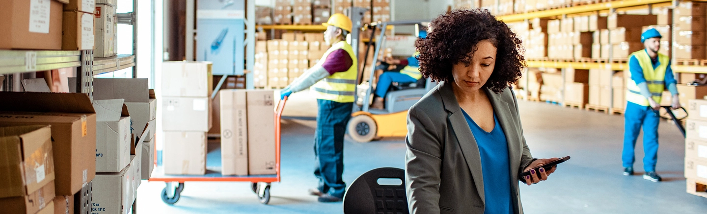 Woman supervising in warehouse